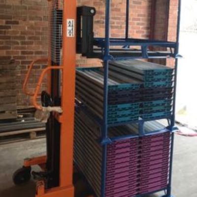 UCP Core tray storage pods being safely transported via a stacker truck.